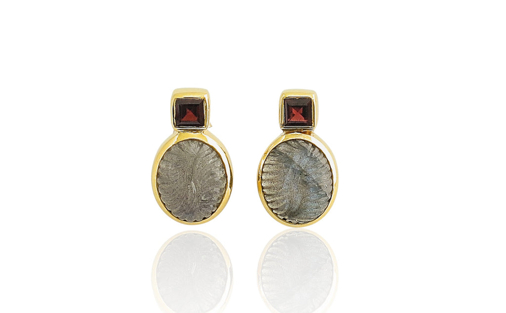 Dickinsonia and garnet ear studs