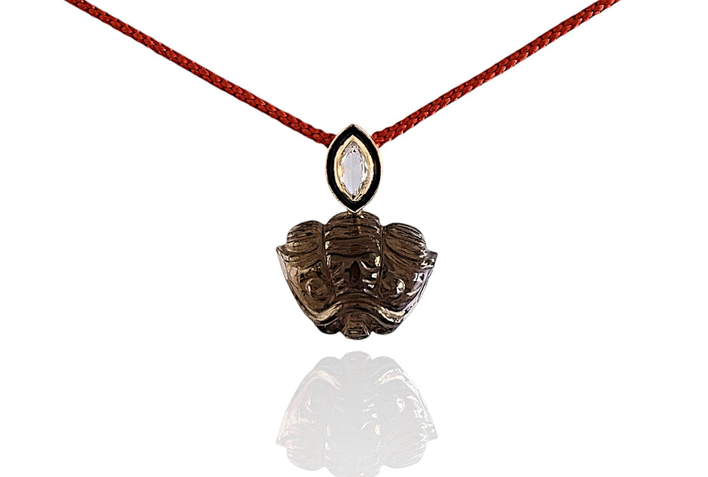 Rolled smoky quartz eye trilobite pendant