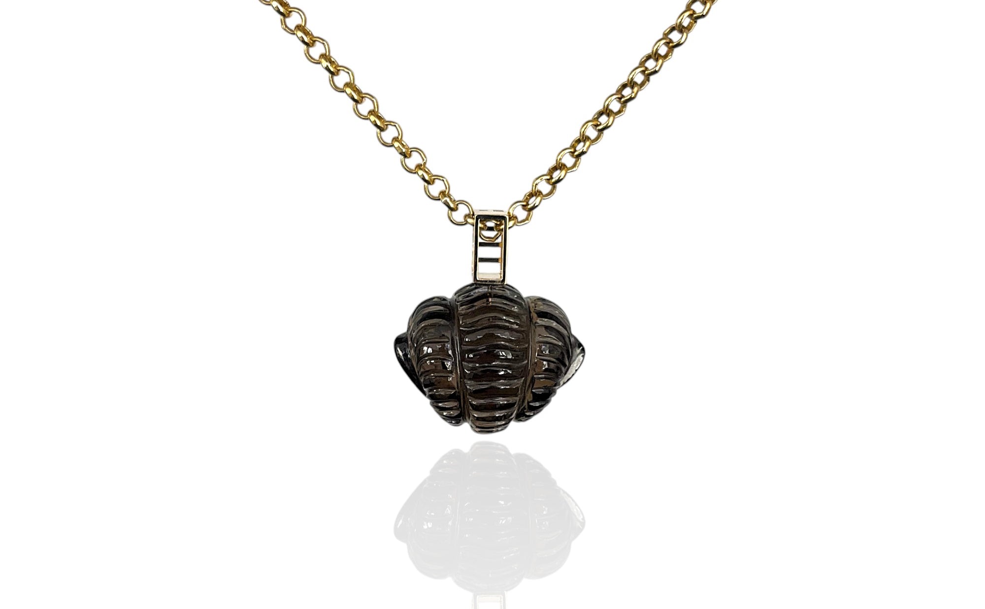 trilobite rolled up smoky quartz gold pendant 